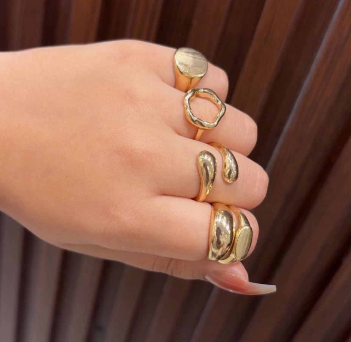 Gold chunky signet ring (pinky finger)