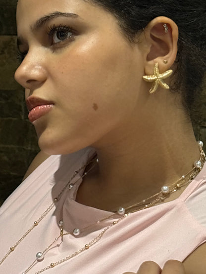 Gold starfish earrings
