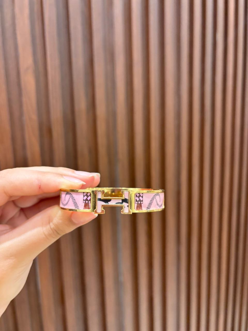 Pink patterned hermes bracelets