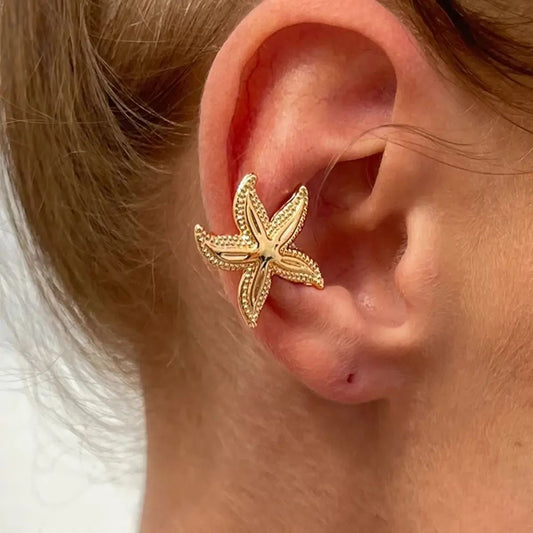 Fake starfish piercing